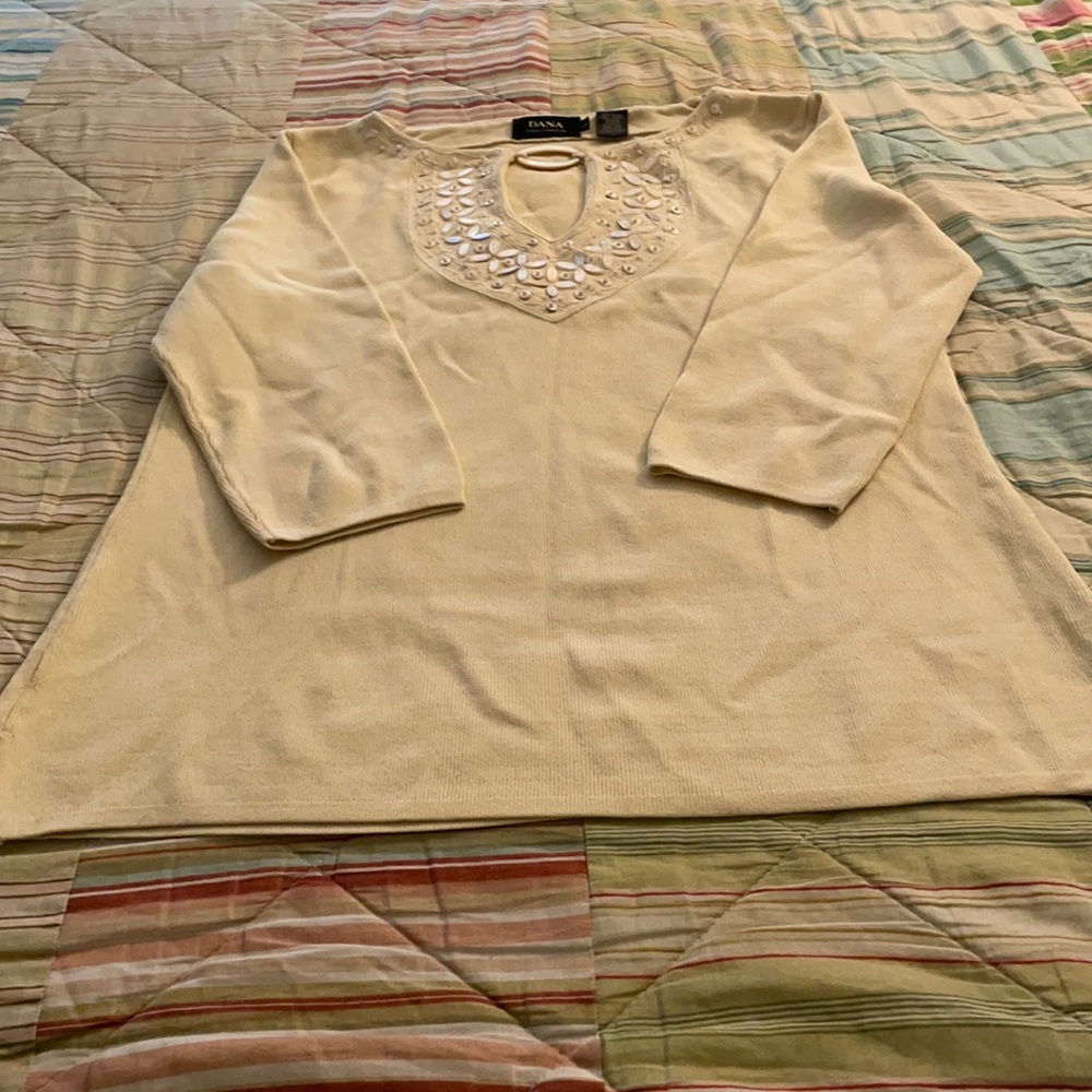 Cream sequence sweater.